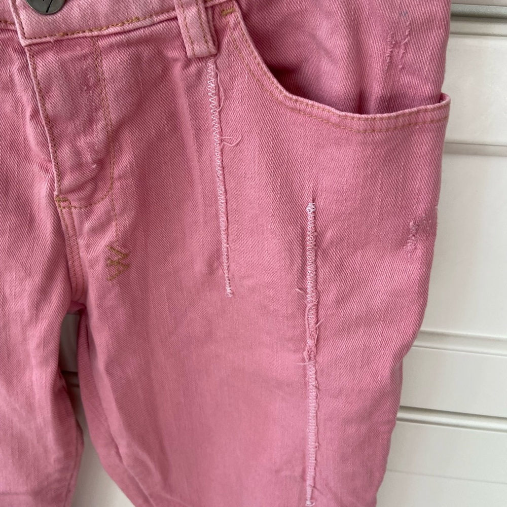 Ksubi 90’s style low rise jeans in pink over dyed denim .